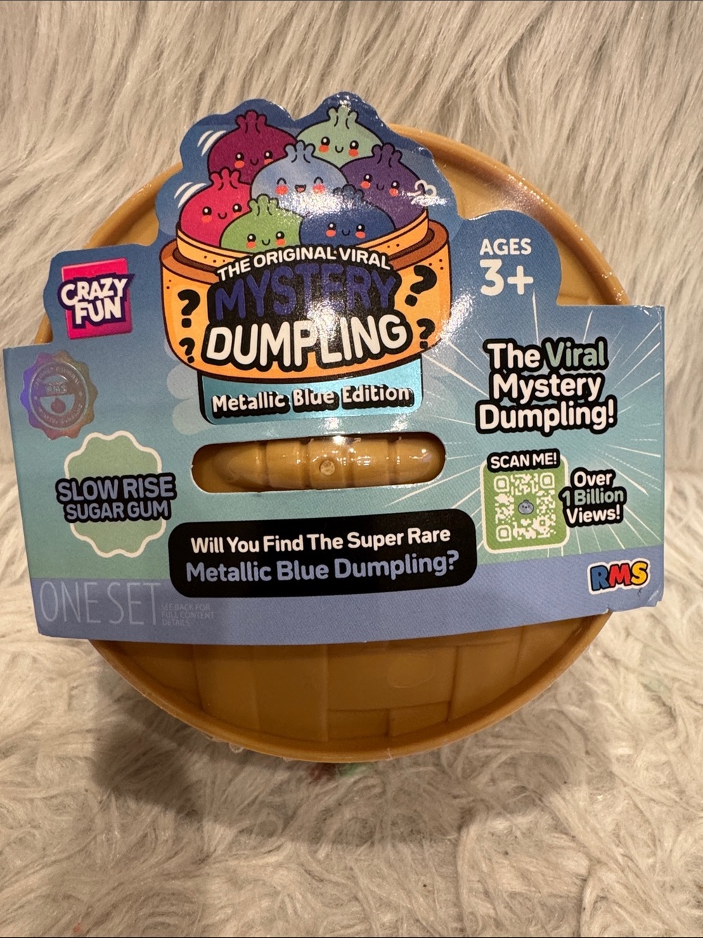 The Original Viral Mystery Dumpling - Metallic Blue Edition with Yellow Case